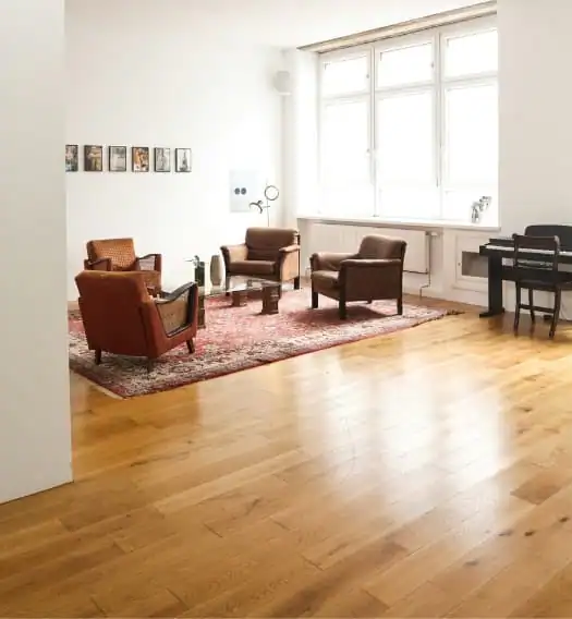 Hardwood floor installation completed in a guest room of a Santa Monica home with natural wood floor finish.